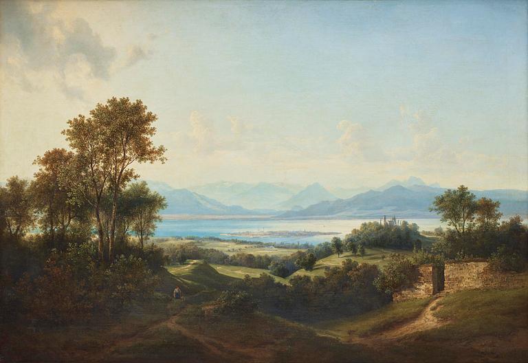 Alplandskap med sjö och slott.