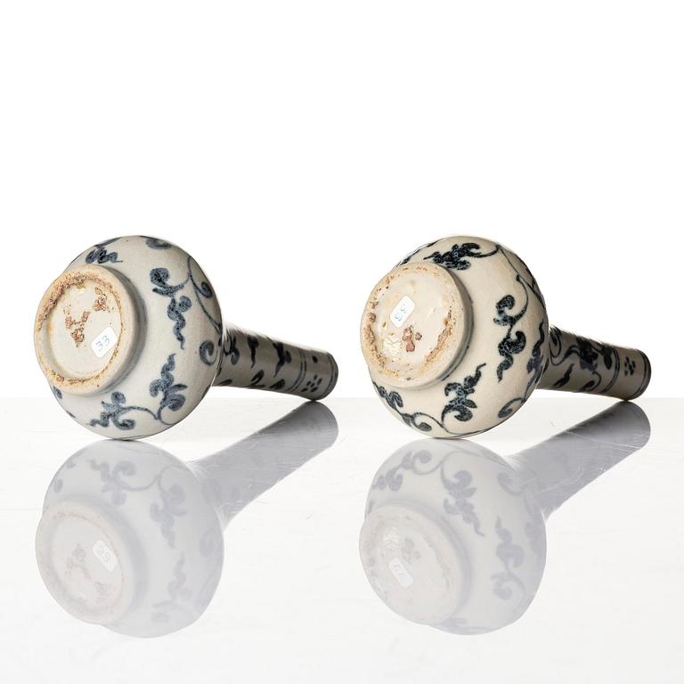 A pair of blue and white lotus vases/water sprinklers, Ming dynasty (1368-1644).