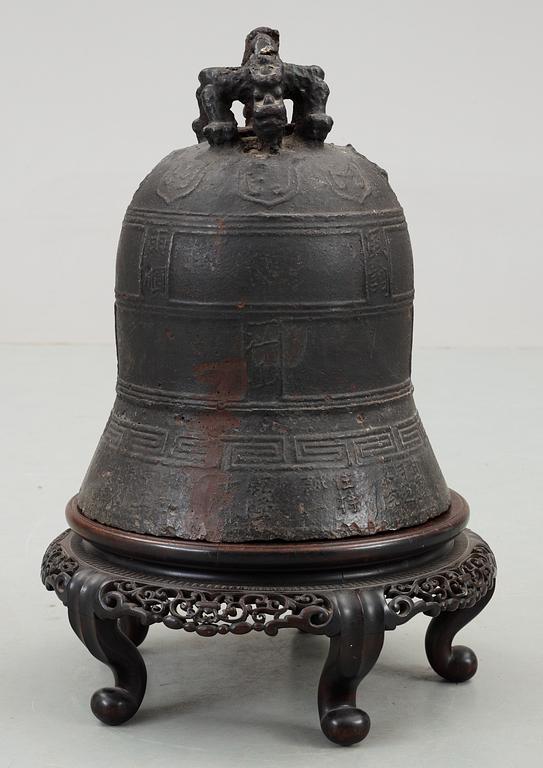 A large bronze temple bell, presumably Ming dynasty.