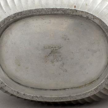 One pewter bowl and a pair of candleholders by Just Andersen, Denmark.