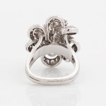 An 18K white gold WA Bolin ring set with round brilliant-cut diamonds.