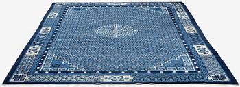 A semi-antique Baotou carpet, West China, c. 335 x 246 cm.