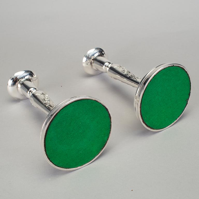 A pair of silver candlesticks by Meya Lerible for Mema, Linköping 1994.