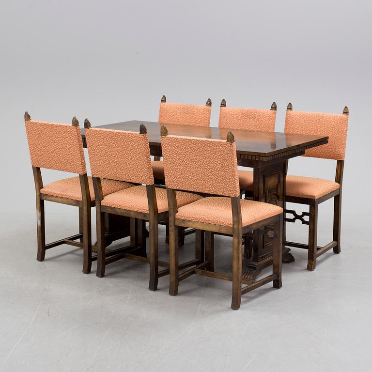 A 1920´s dinner table and six chairs probably designed by Axel Einar Hjorth for AB Svenska möbelfabriken Bodafors.