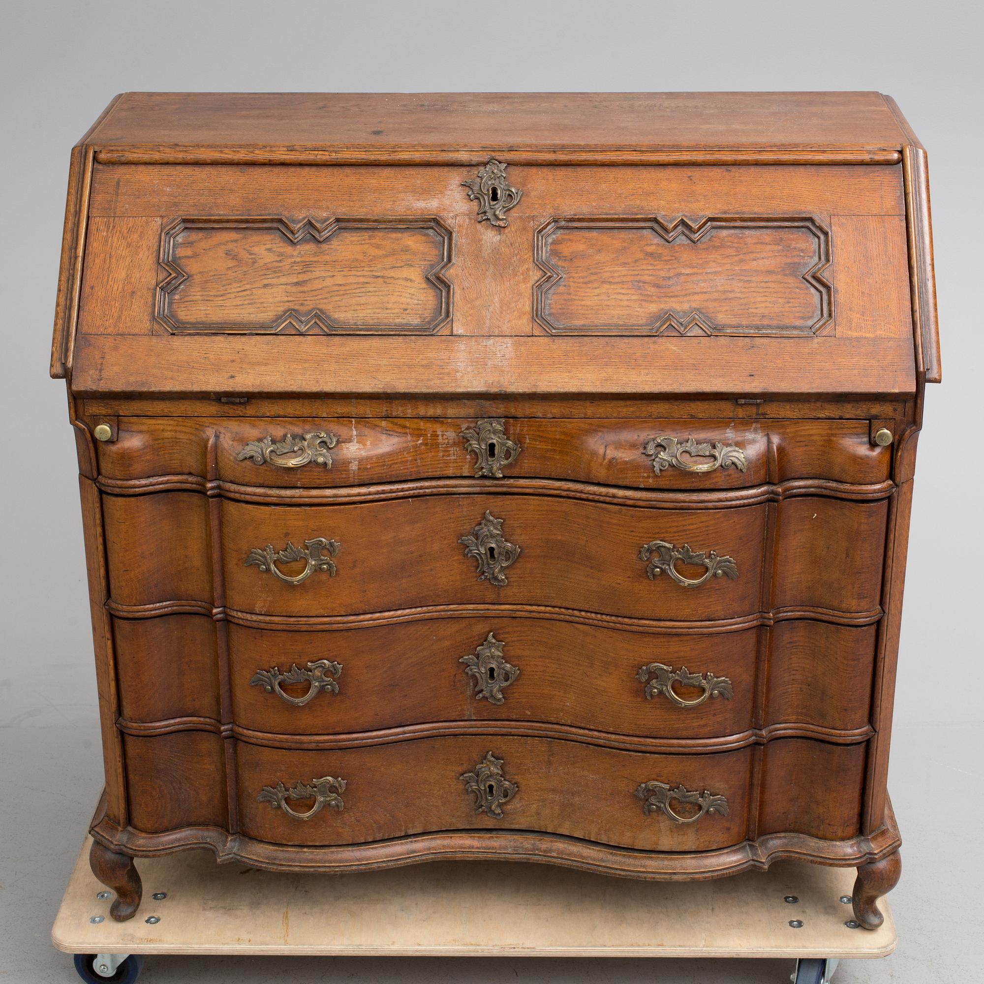 A NORTHERN EUROPEAN OAK SECRETAIRE, second half of the 18th century.