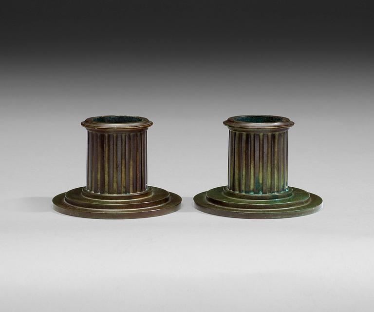 A pair of bronze candlesticks probably by Jacob Ängman GAB, Stockholm, 1920-30-tal.