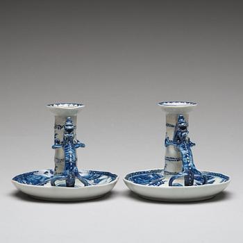 A pair of blue and white candle sticks, Qing dynasty, Qianlong (1736-95).