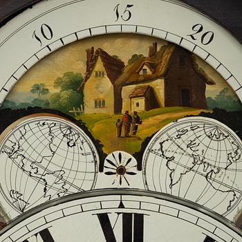 A long-case clock, England, 19th century.