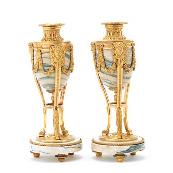 A pair of Louis XVI-style mid 19th century candlesticks/cassolettes.