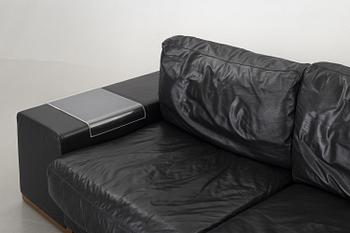A 'Domino' leather sofa from Natuzzi, Italy, 21st Century.