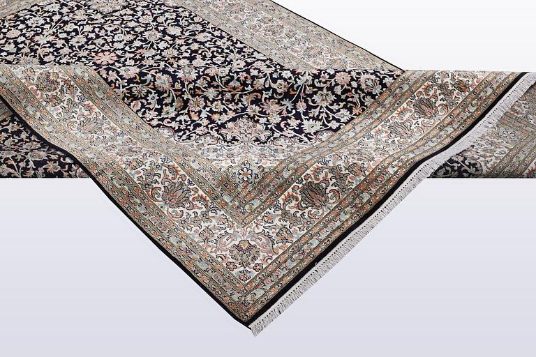 A carpet, silk Kashmir, ca 279 x 195 cm.