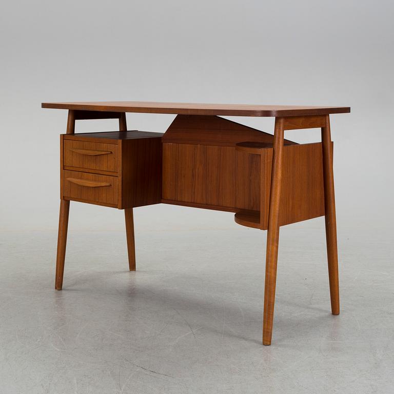 A mid 20th century writing desk from Tibergaard Denmark.