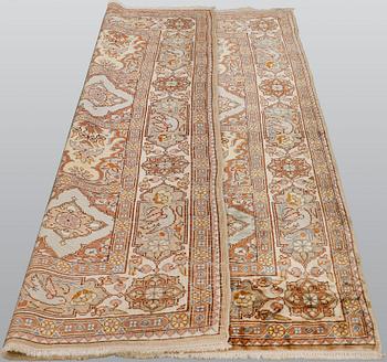 A semi-antique figural Kaysari silk carpet, approx. 100 x 70 cm.