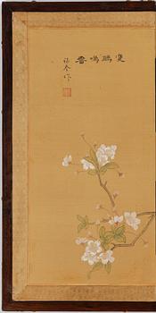 A Chinese folding screen, 20th century.