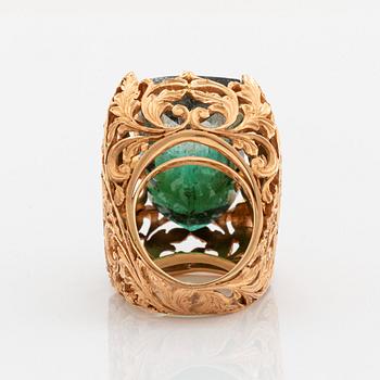 A Tina Karlsson ring in 18K gold set with a large step-cut tourmaline.