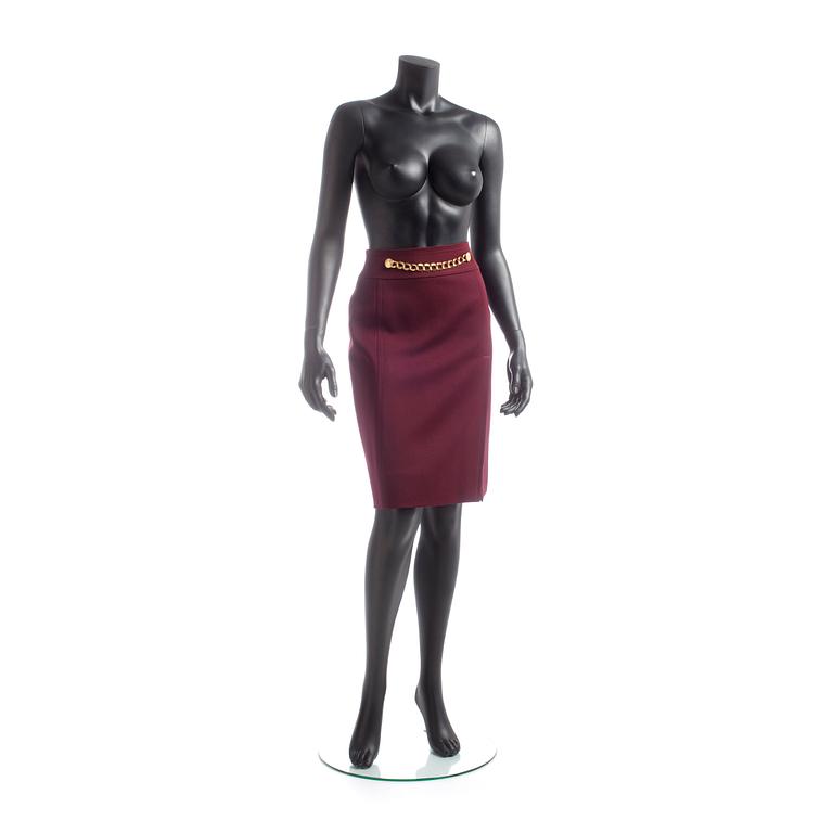 CÉLINE, a burgundy colored wool skirt.