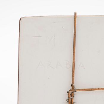 Toini Muona, a stoneware relief for Arabia, signed TM Arabia.
