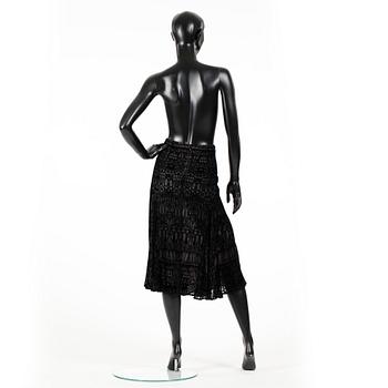 ALEXANDER MCQUEEN, a black skirt.