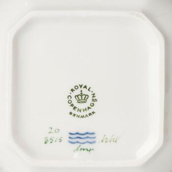 A set with four Royal Copenhagen 'Flora Danica' custard cups with covers and stands, Denmark, 20th century.