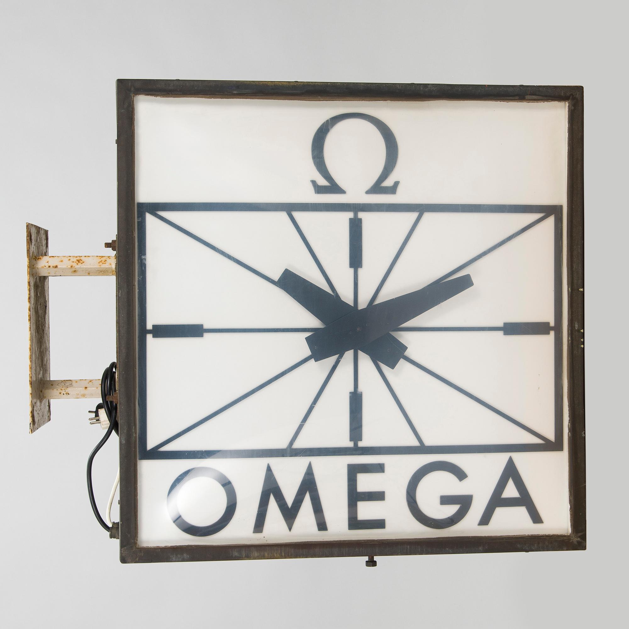 Reklamklocka, Omega, 1900-talets andra hälft.
