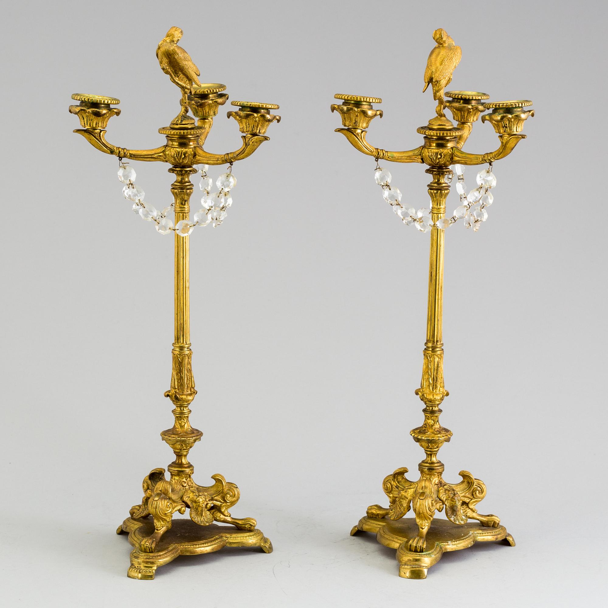 A pair of neorenaissance candelabras, about 1900.