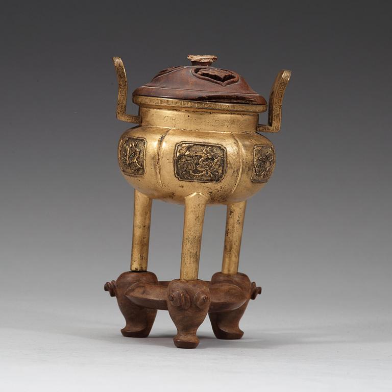 A bronze tripod censer, Qing dynasty, 19th Century.