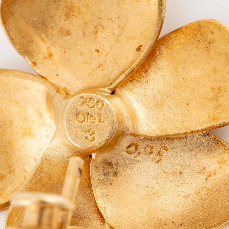 A pair of earrings in the form of flowers in 18K gold with round brilliant-cut diamonds by Ole Lynggaard.