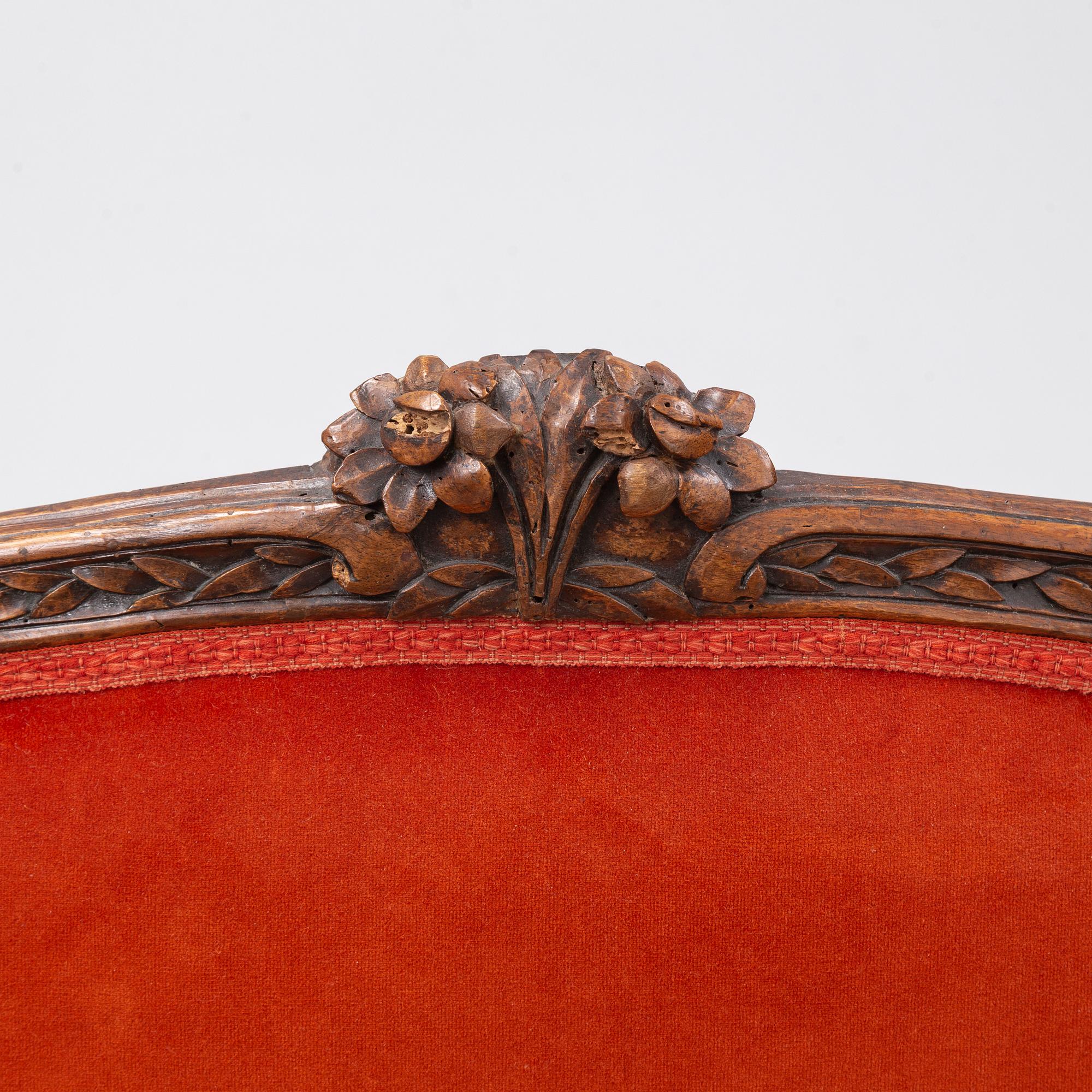 A Louis XV sofa, France, mid 18th Century.