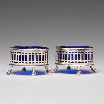 A pair of Swedish 18th century silver and blue glass salt cellars, mark of Pehr Zethelius, Stockholm 1791.