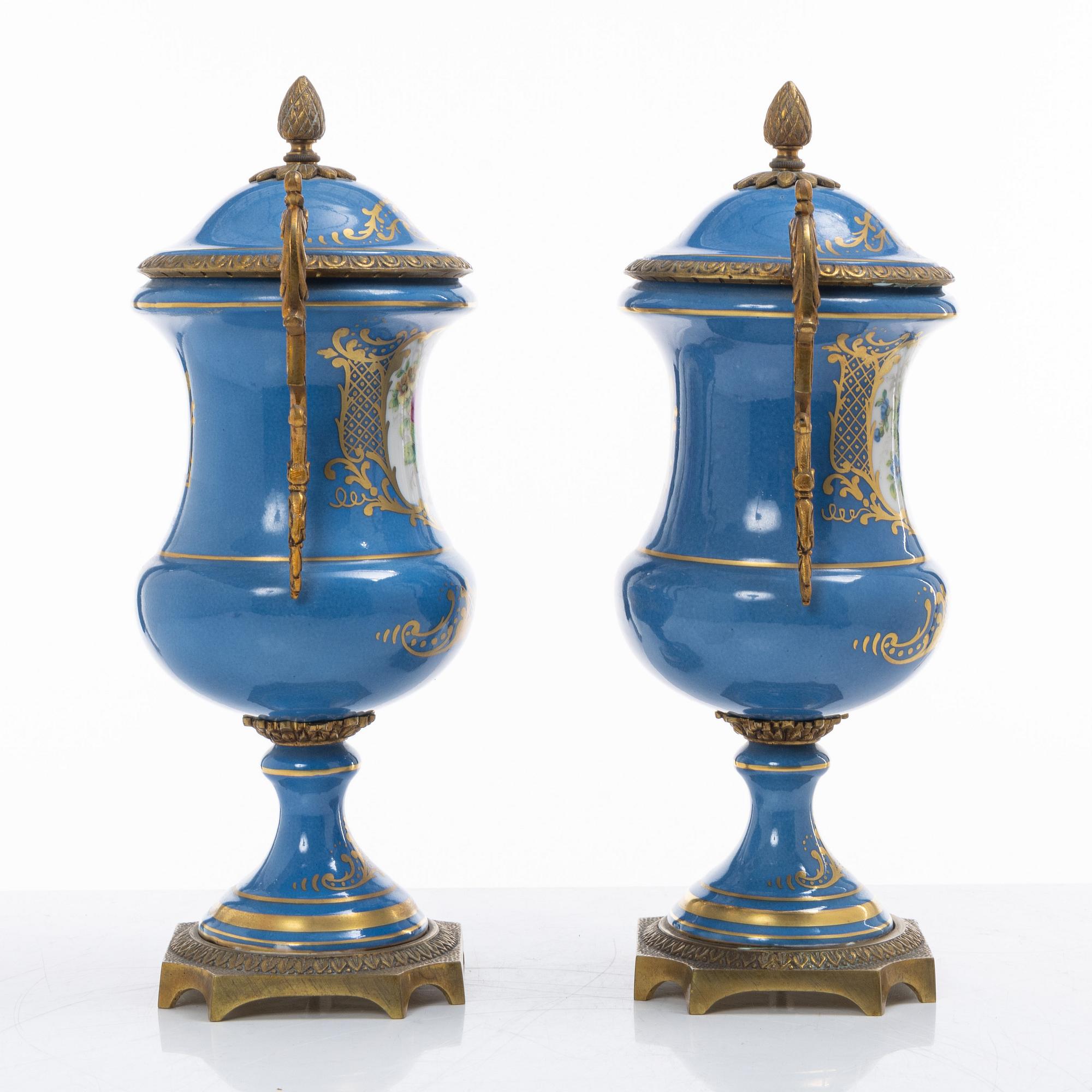 Decorative urns, a pair, porcelain, Sevres-like mark, circa 1900.