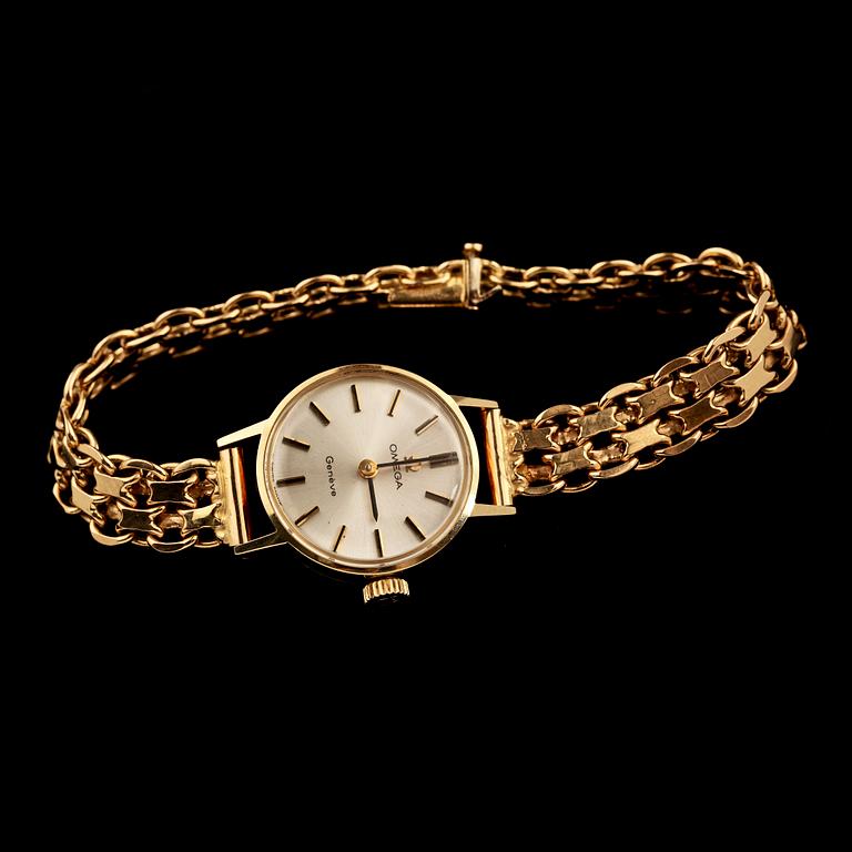 DAMARMBANDSUR, Omega med x-länk i 18 k guld. Vikt 23 g.