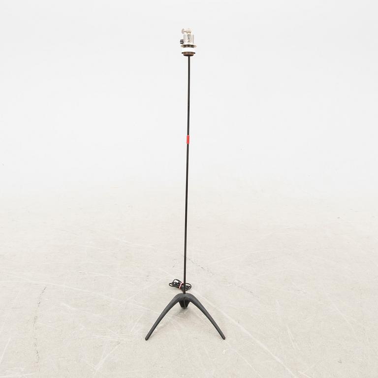 A metal floor lamp from the later part of the 20th century.