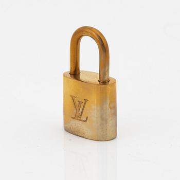 Louis Vuitton, 10 brass padlocks.