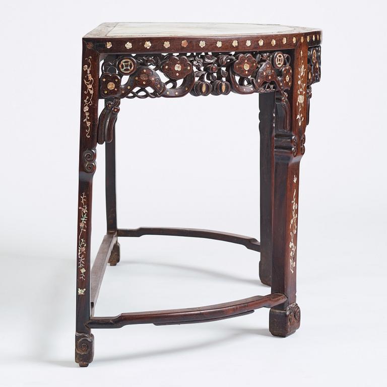 A Chinese hardwood demi-lune side table with mother-of-pearl inlays, late Qing dynasty.