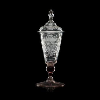 An engraved armorial goblet with cover, 18th Century.