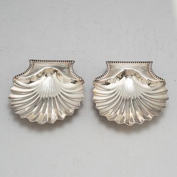 An English early 19th century pair of silver butter-shells, mark of London 1807.