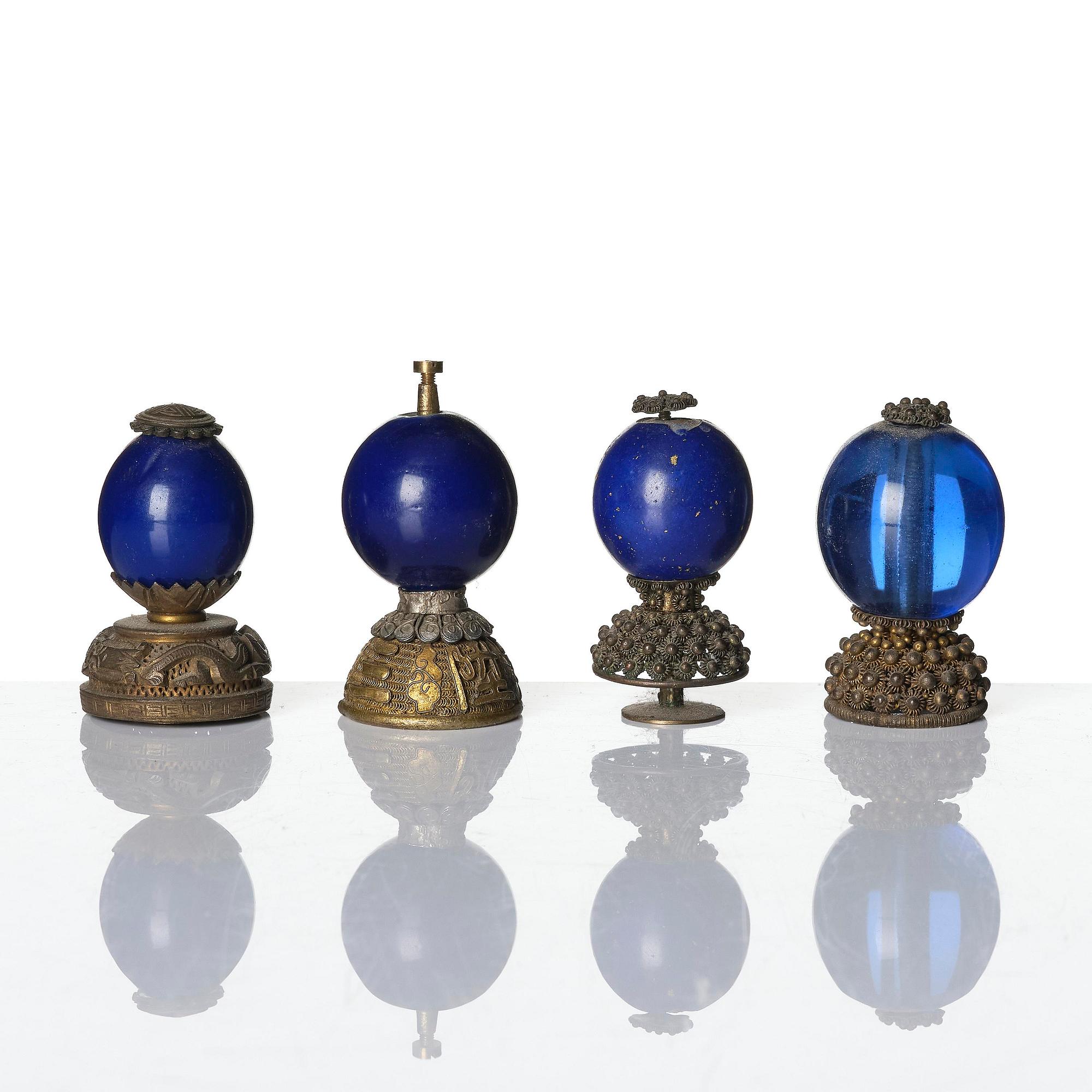 A group of 16 gilt-metal mandarin insignias, Qing dynasty, 19th century.