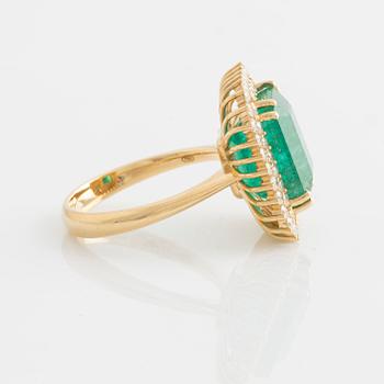 Ring with emerald-cut emerald and brilliant-cut diamonds.