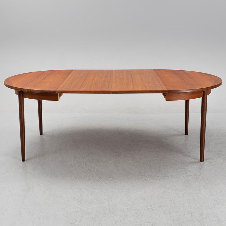 A teak 1950's/60's dining table.