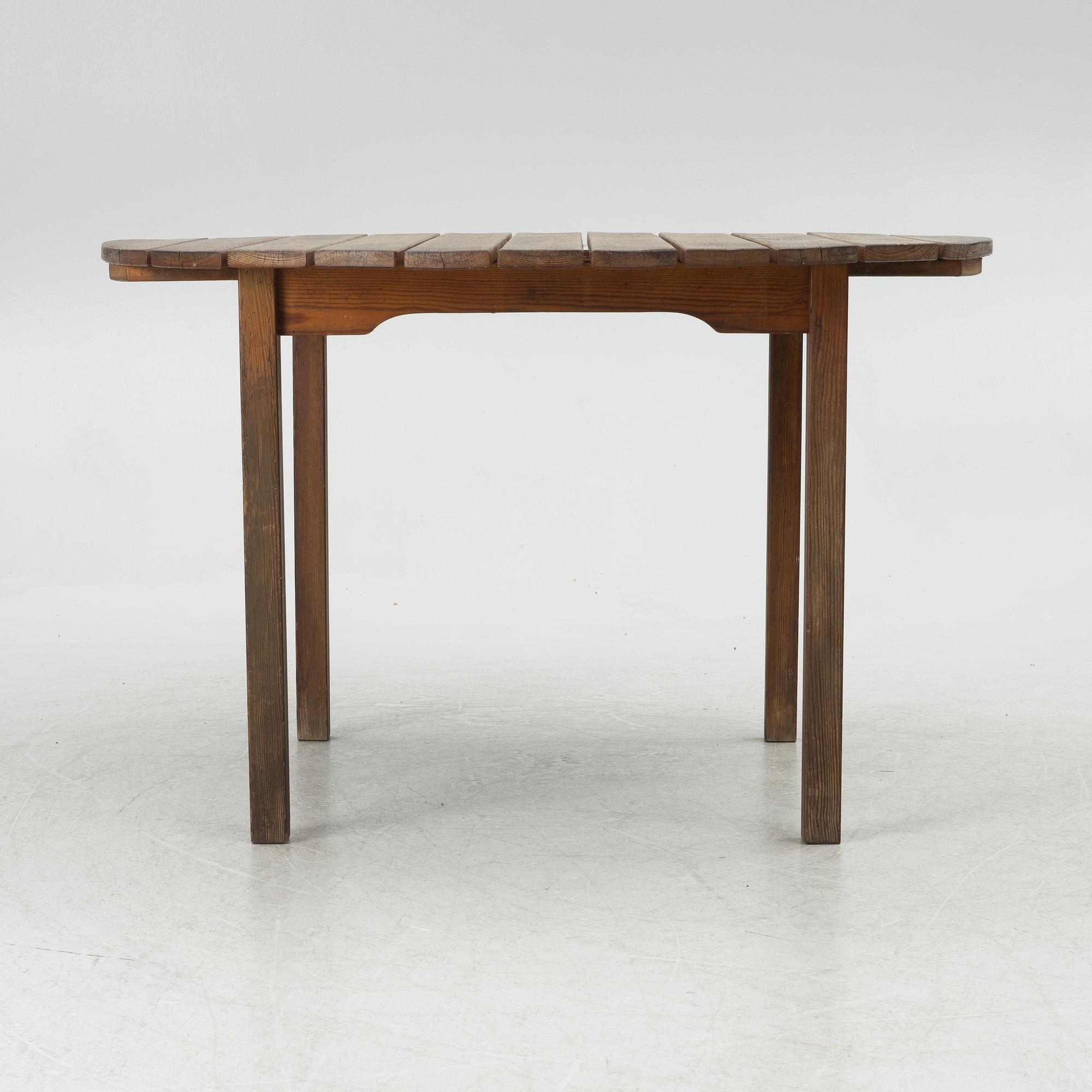Carl Malmsten, garden furniture, a table and two armchairs. "Bergshamra", second half of the 20th century.