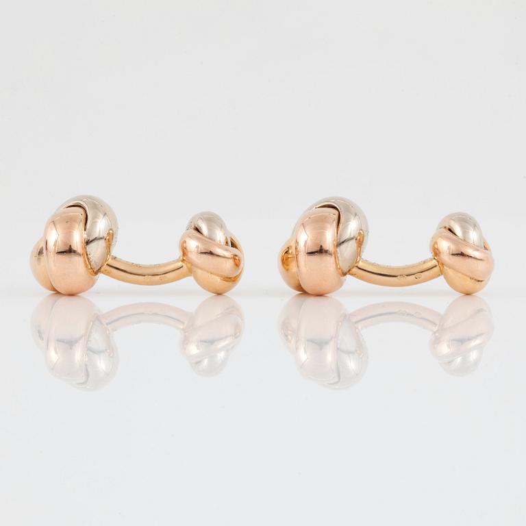 A pair of Cartier "Trinity" cufflinks. Serial number K02862.