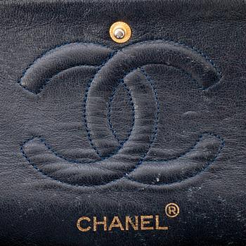 CHANEL, a quilted blue leather "Double Flap" shoulder bag.