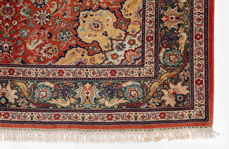 A part silk Tabriz carpet, c. 268 x 179 cm.