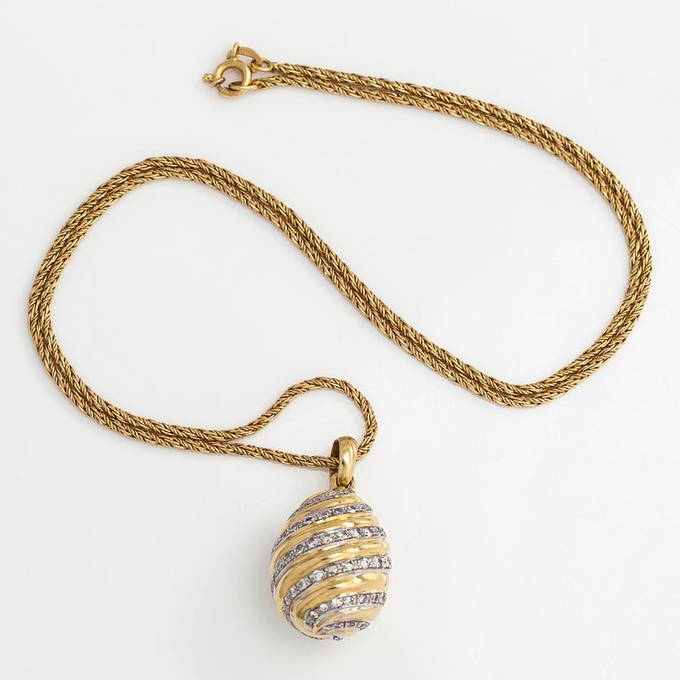 Cartier, a "Pendentif Oeuf"  diamond pendant and chain, 18K gold.