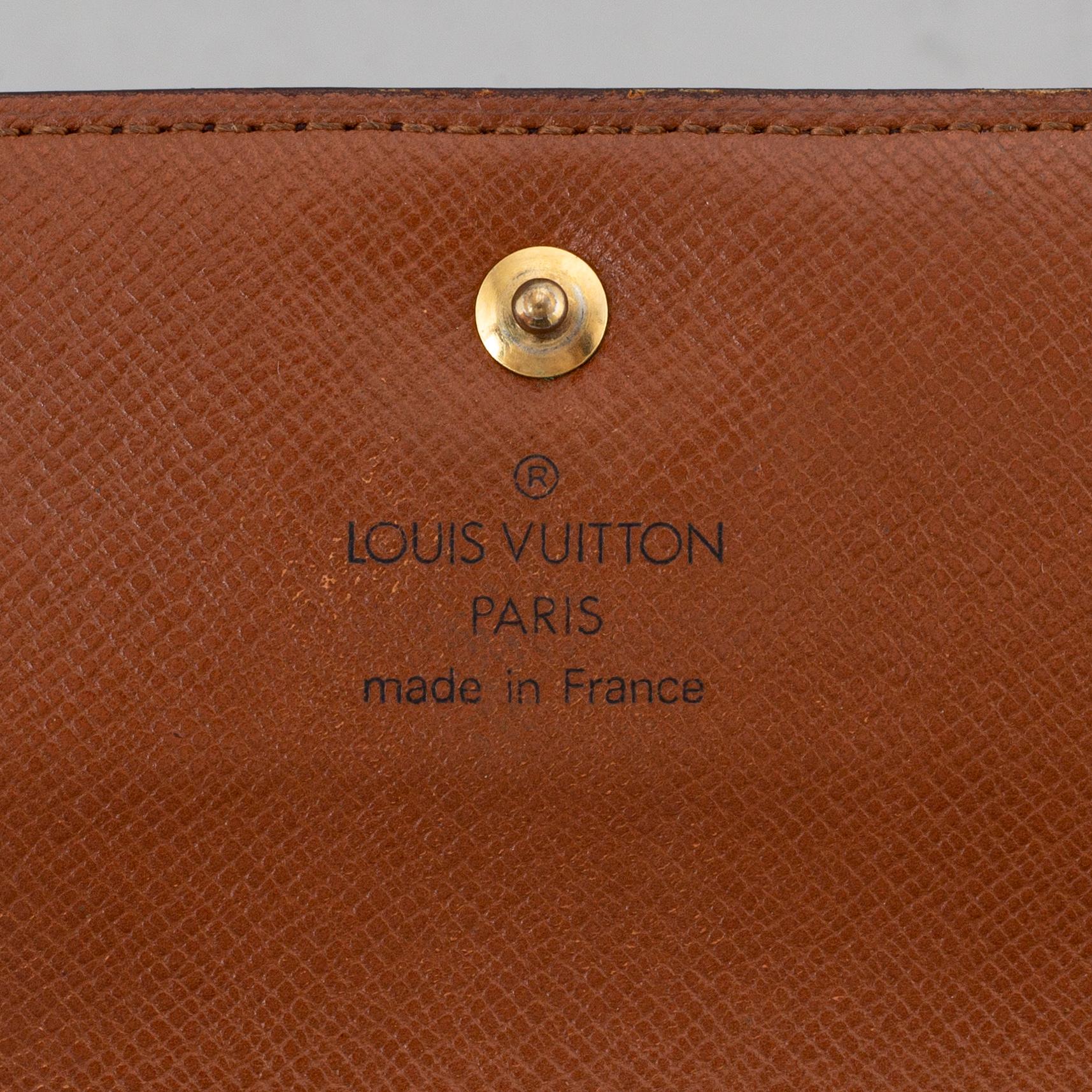 LOUIS VUITTON, a monogram canvas wallet.