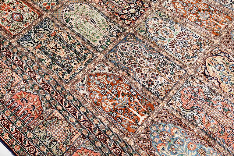 A silk Kashmir carpet, 286 x 265 cm.