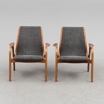 a pair of 'Laminett' easy chairs by Yngve Ekström, Swedese, 21th century.