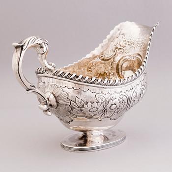 An English early 19th century silver cream-jug, mark of Abraham Peterson, London 1803.