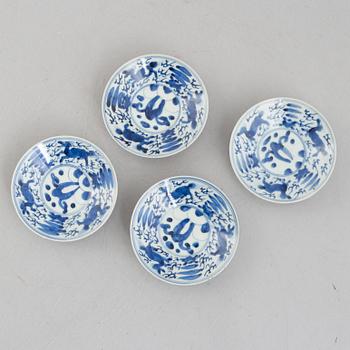 A set of four blue and white Chinese porcelain dishes, 19th century.