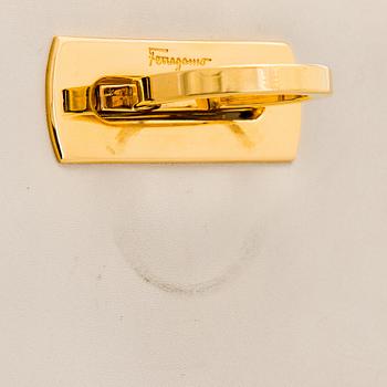 Salvatore Ferragamo, a leather “Gancini”bag.
